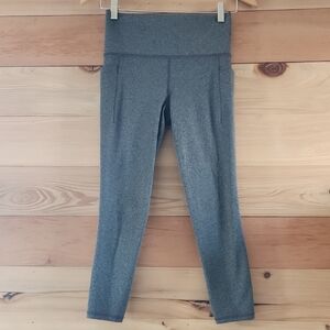 Athleta Charcoal Salutation Stash Pocket Tights